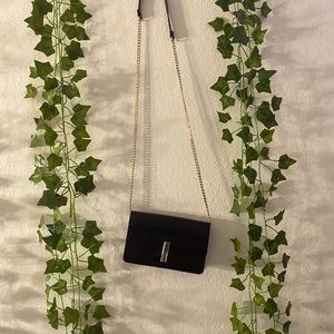 Black long shoulder purse gold chain and gold clip